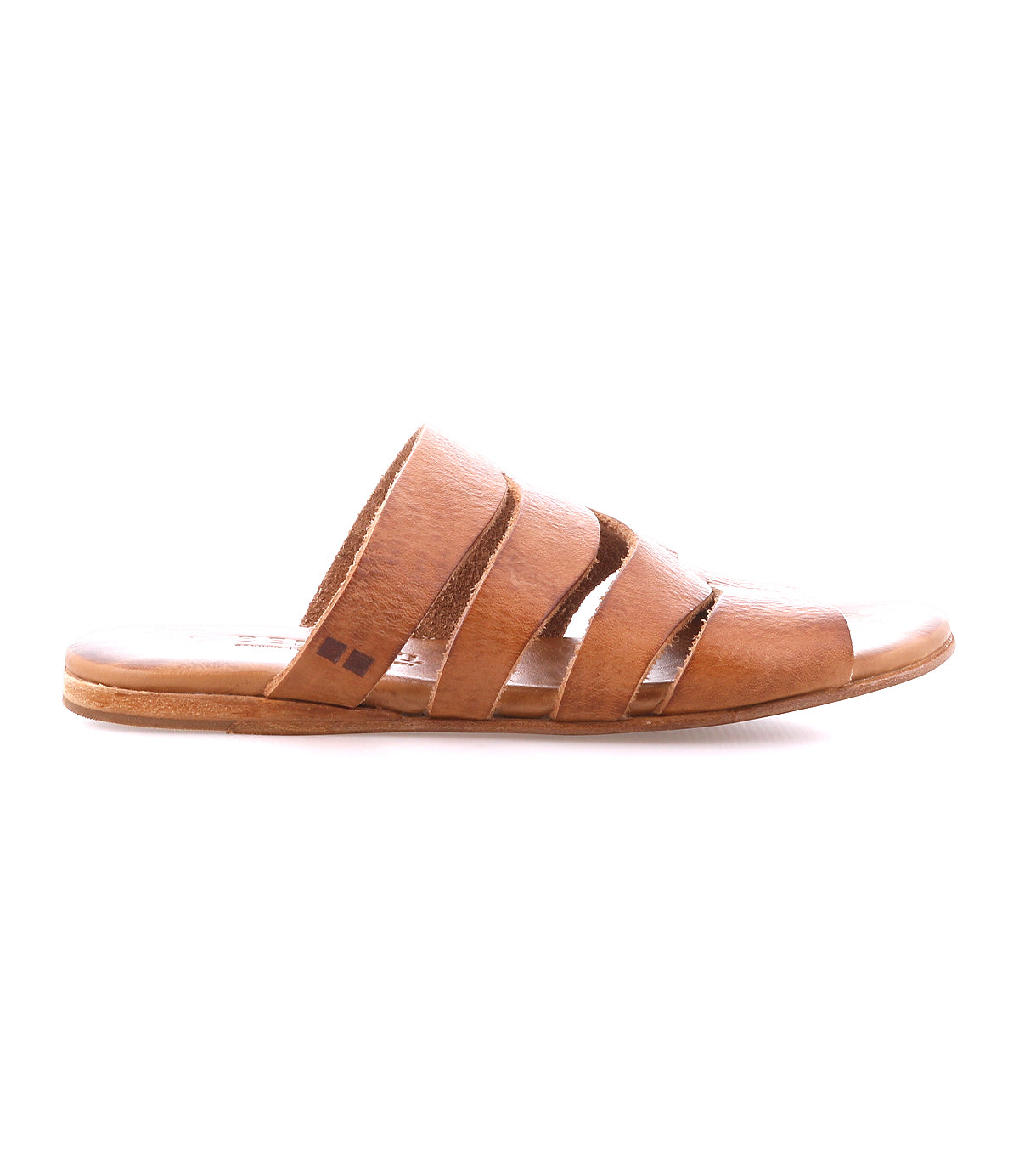 The Bed|Stü Margin is a brown leather slide sandal with a leather upper, featuring three horizontal straps and a flat sole. Seen in side profile against a white background, it's an essential addition to any summer wardrobe.