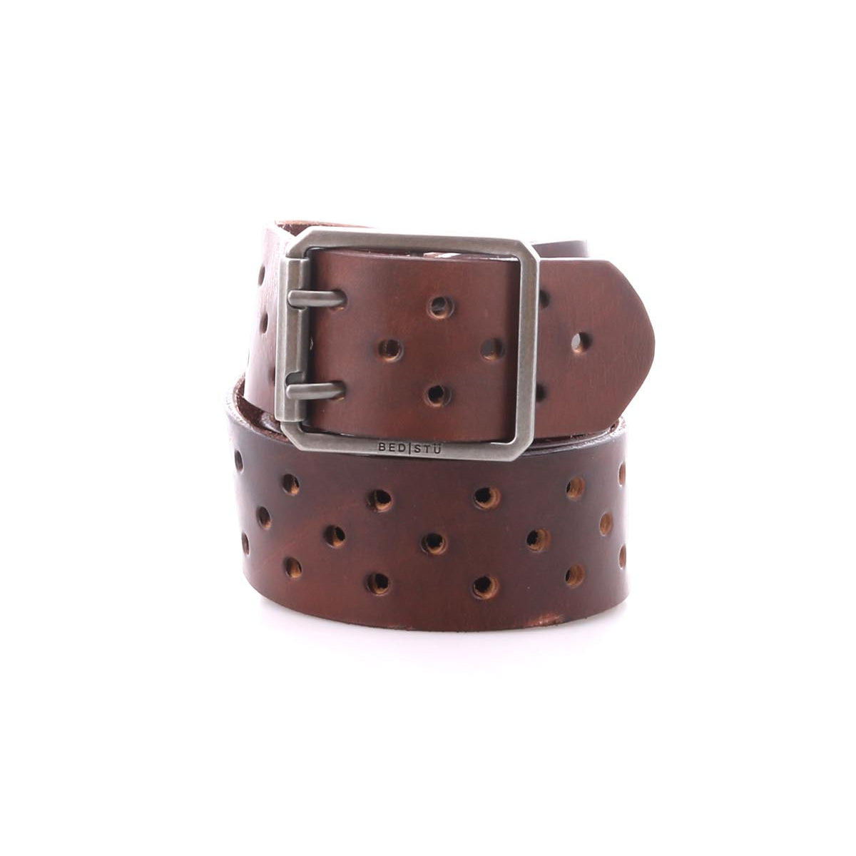 The Bed|Stü Mccoy is a brown leather belt with a durable metal buckle and multiple round holes for a customizable fit, featuring a sturdy leather strap coiled on a white background.