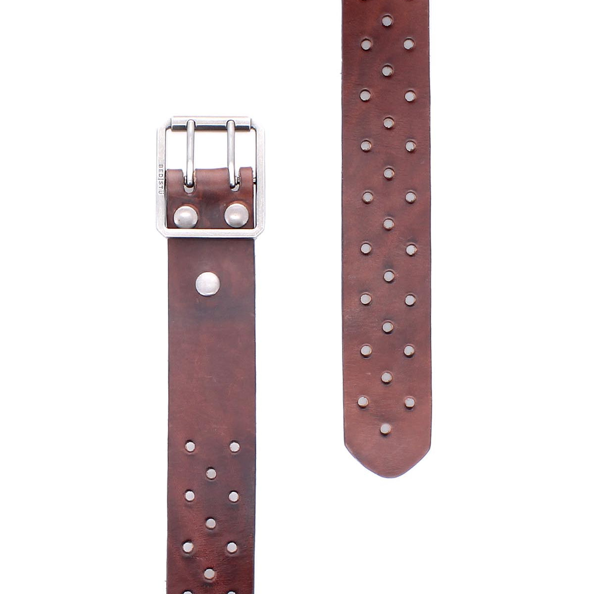 The Bed|Stü Mccoy is a brown leather belt featuring two rows of silver studs, a sturdy square silver metal buckle, and an adjustable fit, displayed flat against a white background.