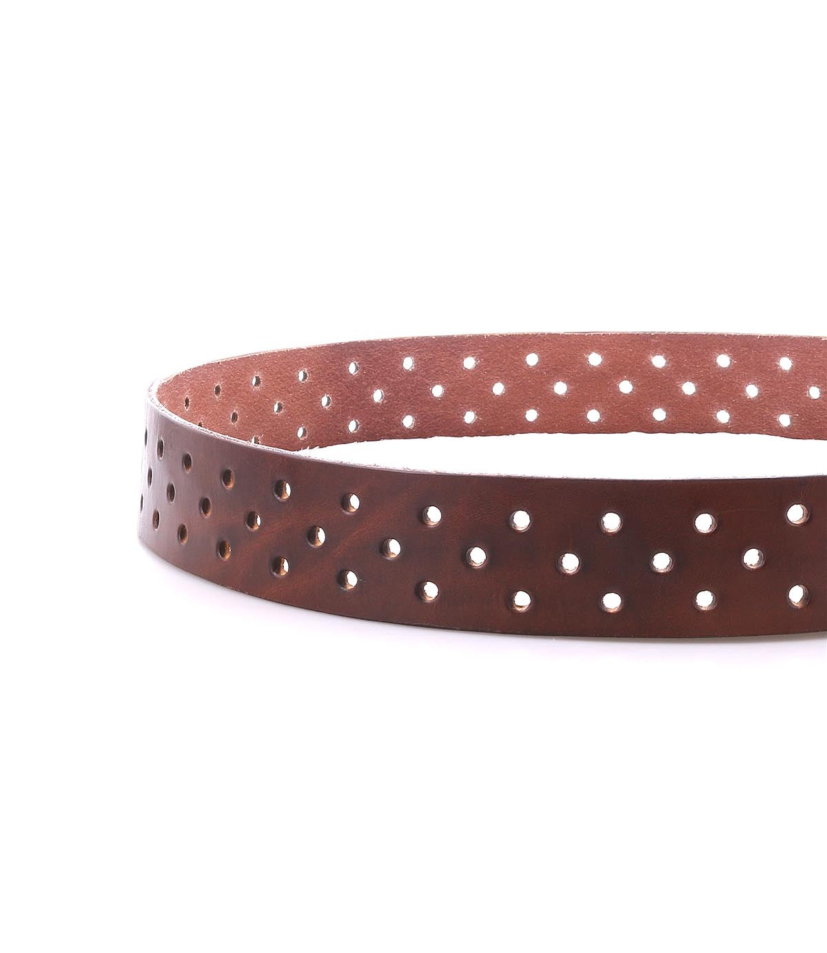 The Bed|Stü Mccoy is a brown leather belt featuring a durable metal buckle and multiple evenly spaced round holes along the strap, displayed in a circular shape on a white background for an adjustable, customizable fit.