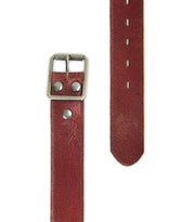 The Meander belt by Bed|Stü is crafted from rich brown distressed leather, showcasing an antique metal buckle and sturdy metal rivets, displayed with both its square buckle end and pointed end featuring punched holes.