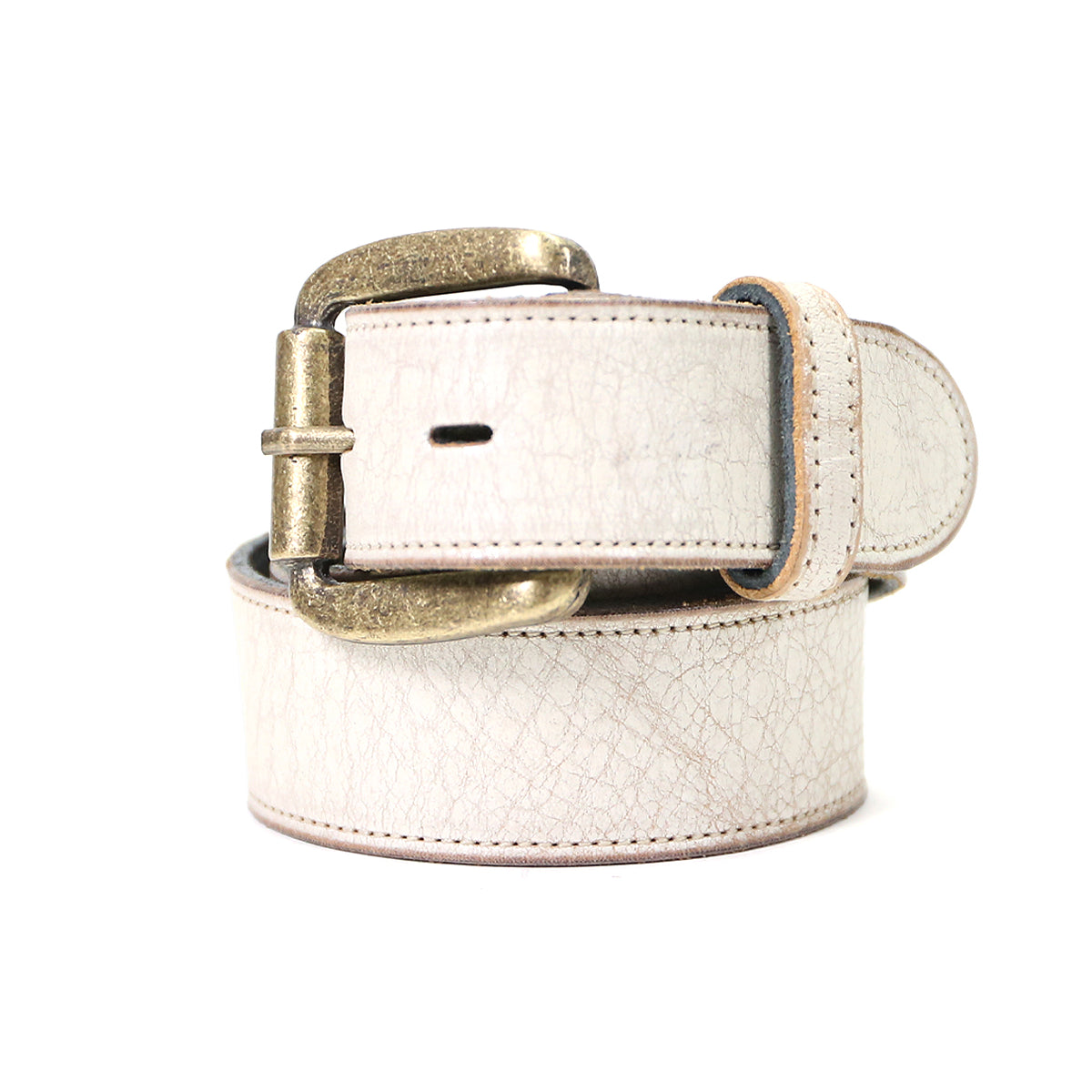 The Bed|Stü Meander belt, crafted from distressed white leather with a visible textured finish and featuring an antique metal buckle, is displayed rolled up against a plain white background.