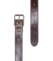 The Bed|Stü Meander is a brown distressed leather belt featuring an antique metal buckle and two rivets, displayed both lengthwise and at the buckle end on a white background.