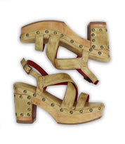 A pair of Mediation tan leather heeled slingback sandals by Bed|Stü with open toes, thick wooden heels, and brass studs, featuring cushioned insoles for added comfort, displayed side by side on a white background.