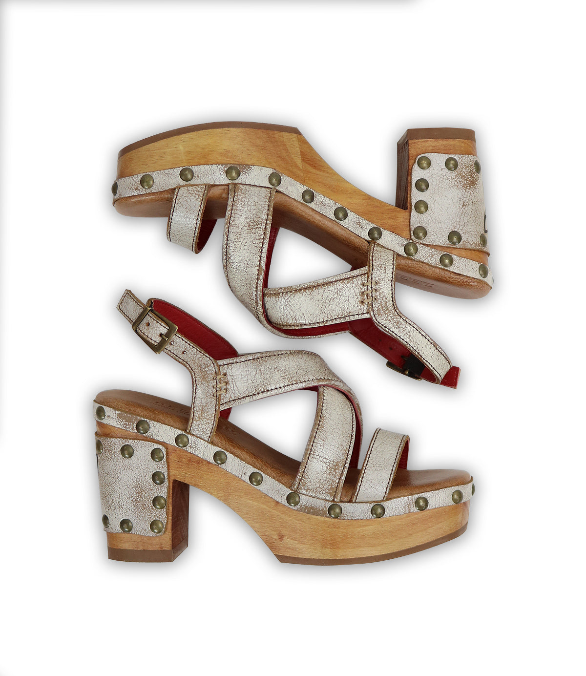 The Bed|Stü Mediation women's heeled slingback sandals feature wooden soles, white textured leather straps adorned with metal studs, cushioned insoles, and red interior accents. The sandals are displayed side by side on a white background.