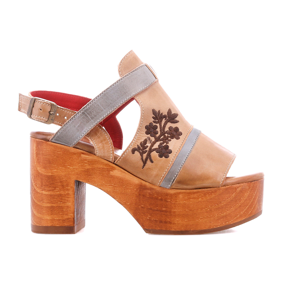 The Melodramatic by Bed|Stü is a tan and gray platform sandal featuring a chunky leather heel, open toe, ankle strap, red inner lining, and floral embroidered leather on the upper.