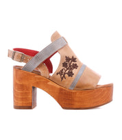 The Melodramatic by Bed|Stü is a tan and gray platform sandal featuring a chunky leather heel, open toe, ankle strap, red inner lining, and floral embroidered leather on the upper.