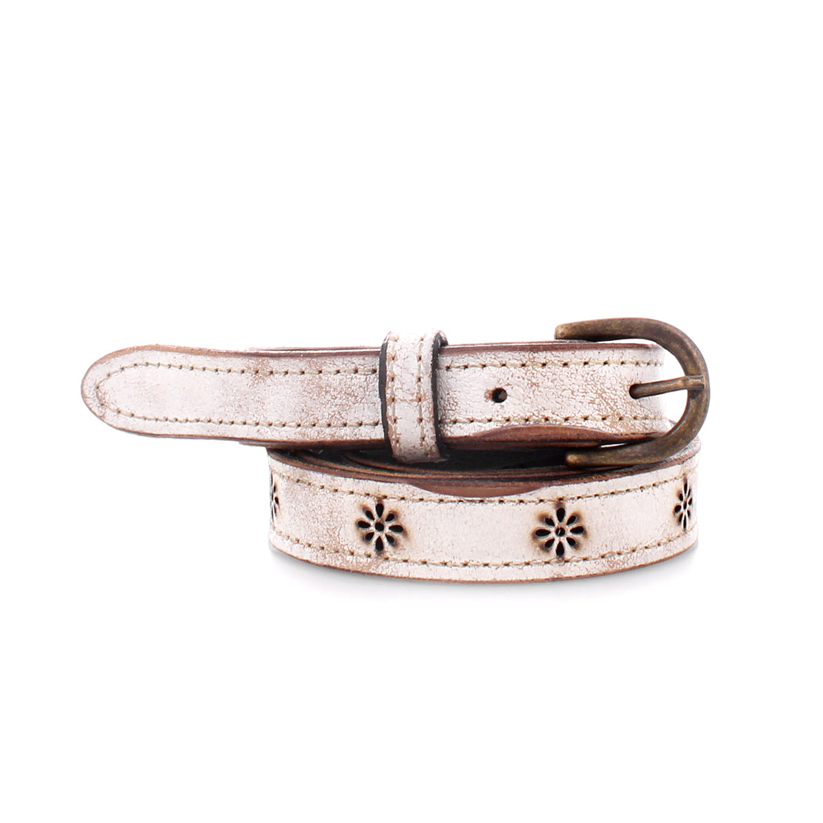 The Monae II by Bed|Stü is a white leather belt featuring floral cutout patterns, a metal buckle, and a distressed finish, shown coiled against a white background. This versatile women’s belt effortlessly brings charm and style to any outfit.