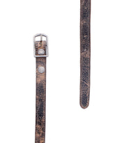 Two segments of the Bed|Stü Monae distressed brown slim leather belt, featuring a timeless silver buckle and metal studs, are shown against a white background—an ideal accessory for any everyday wardrobe.
