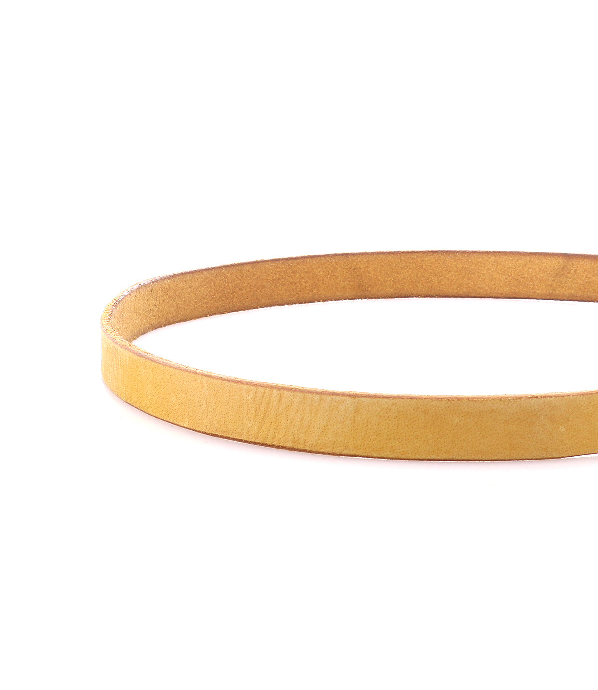 The Monae slim leather belt by Bed|Stü, shown in tan and arranged in a circular shape against a white background with the elegant buckle partially visible, is a classic accessory that effortlessly elevates any everyday wardrobe.
