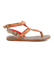The Bed|Stü Moon sandal is a brown leather flat with two buckled ankle straps, a toe loop, red inner lining, and a cushioned insole for comfort, displayed in side profile against a white background.