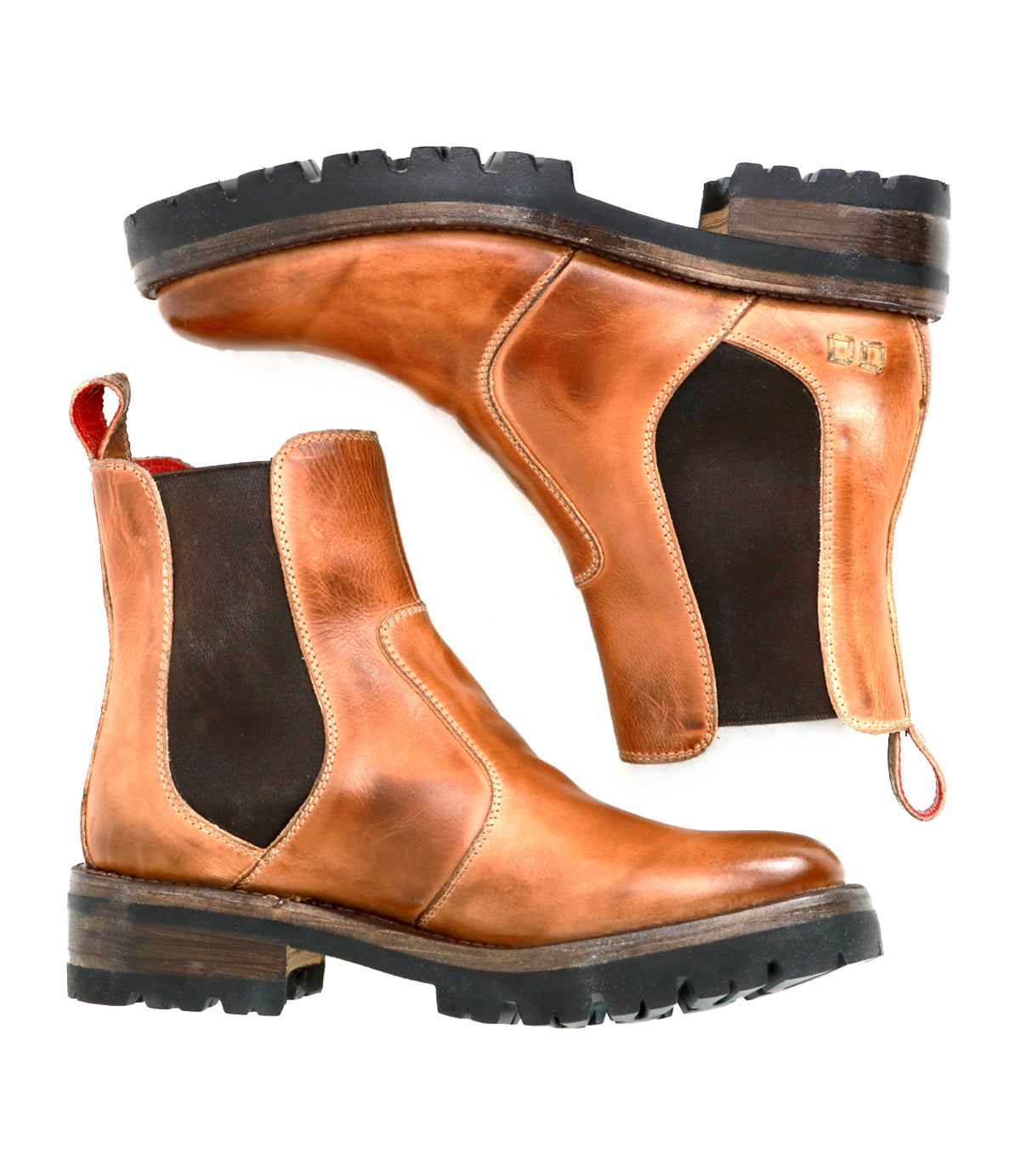 A pair of Bed|Stü Nandi III brown leather Chelsea boots with classic black dual side gores, red pull tabs, and chunky black lug soles, displayed on a white background.