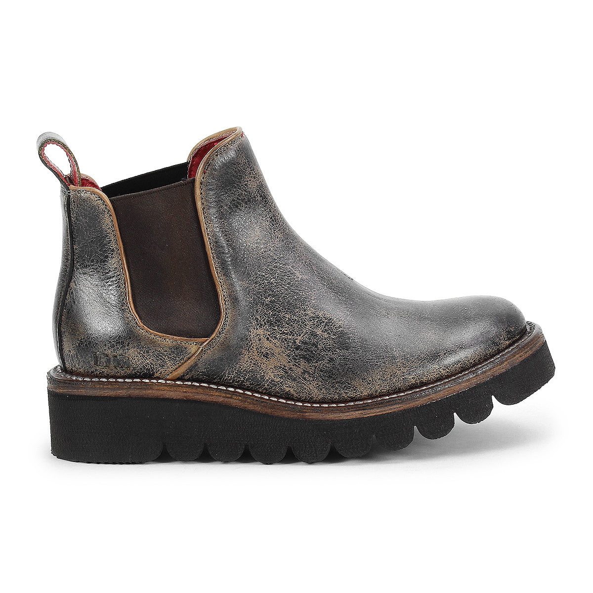 A worn black leather upper Chelsea boot from Bed|Stü, the Novel II features elastic side panels, red lining, a pull tab, and a thick, scalloped platform sole.