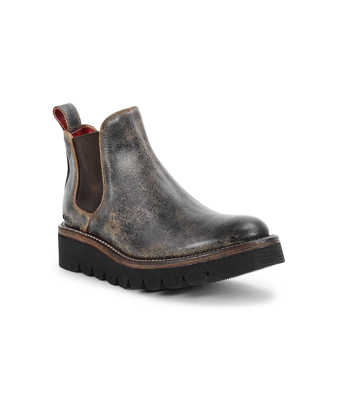 The Bed|Stü Novel II is a distressed brown leather Chelsea boot featuring a leather upper, elastic side panels, a pull tab at the heel, and a thick black sole, displayed on a white background.