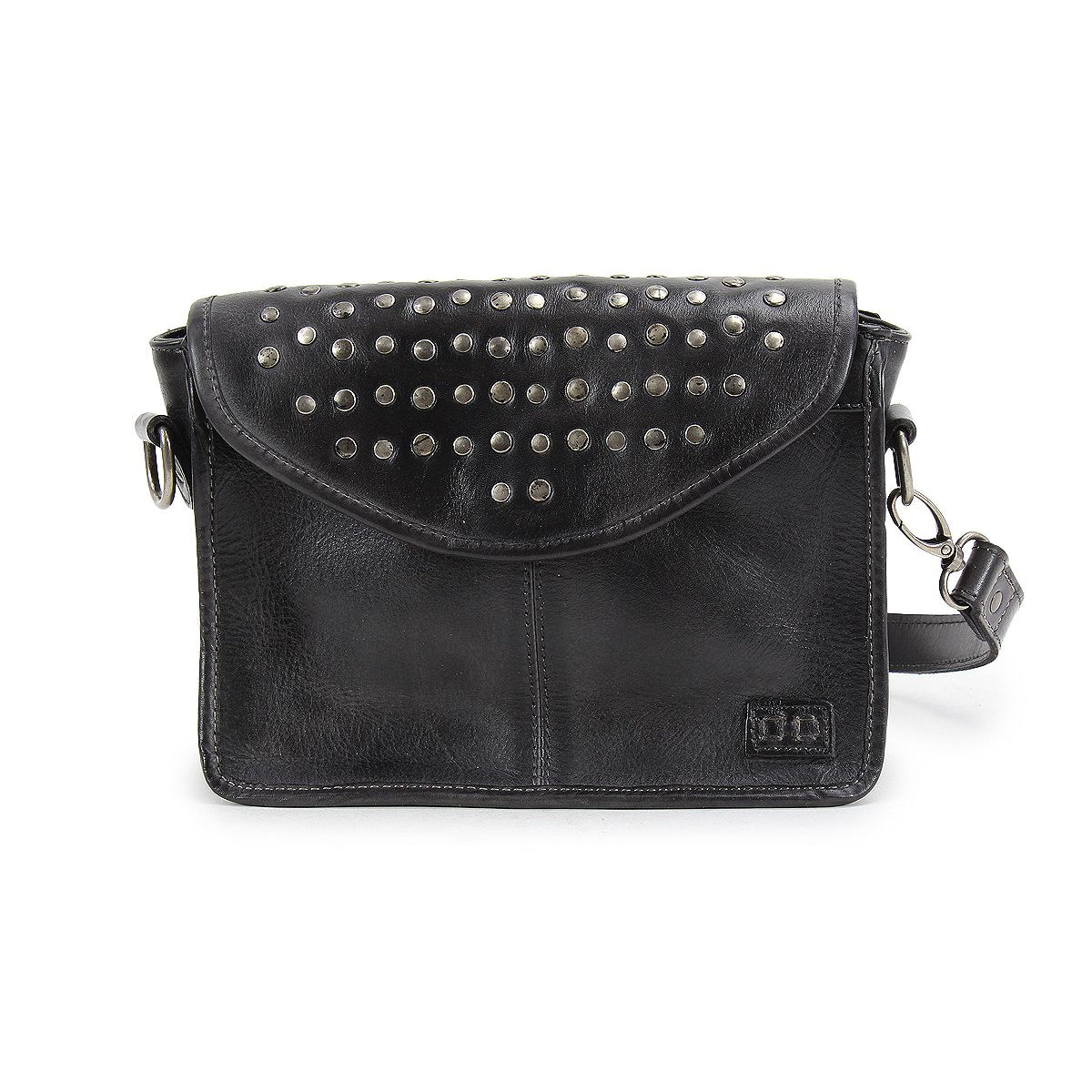 Bed|Stü’s Occurrence is a black leather compact crossbody bag, featuring silver studs on the flap, a detachable shoulder strap, and a stitched logo patch on the front. This versatile clutch transitions seamlessly from day to night.