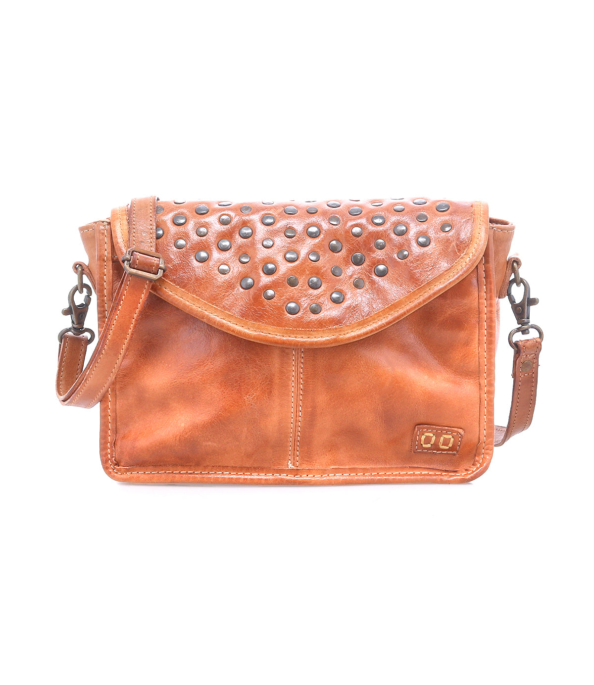 Introducing the Occurrence by Bed|Stü: a brown leather crossbody bag featuring a flap closure adorned with metal studs and an adjustable strap. Photographed on a white background, this compact accessory is perfect for elevating your everyday style.