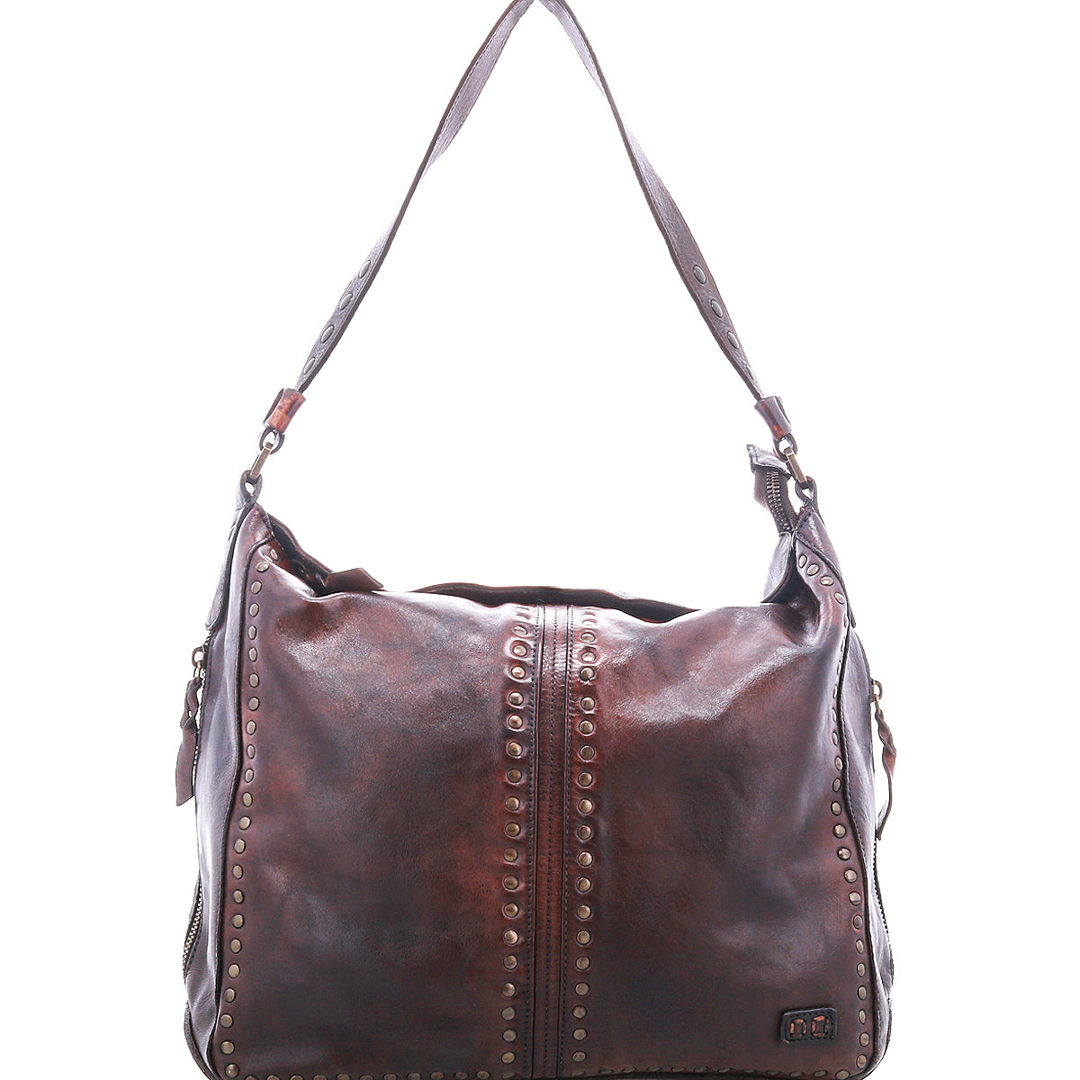 The Packet LTC by Bed|Stü is a large brown leather shoulder tote featuring metal stud detailing, a wide strap, and a slightly worn finish, shown against a white background.