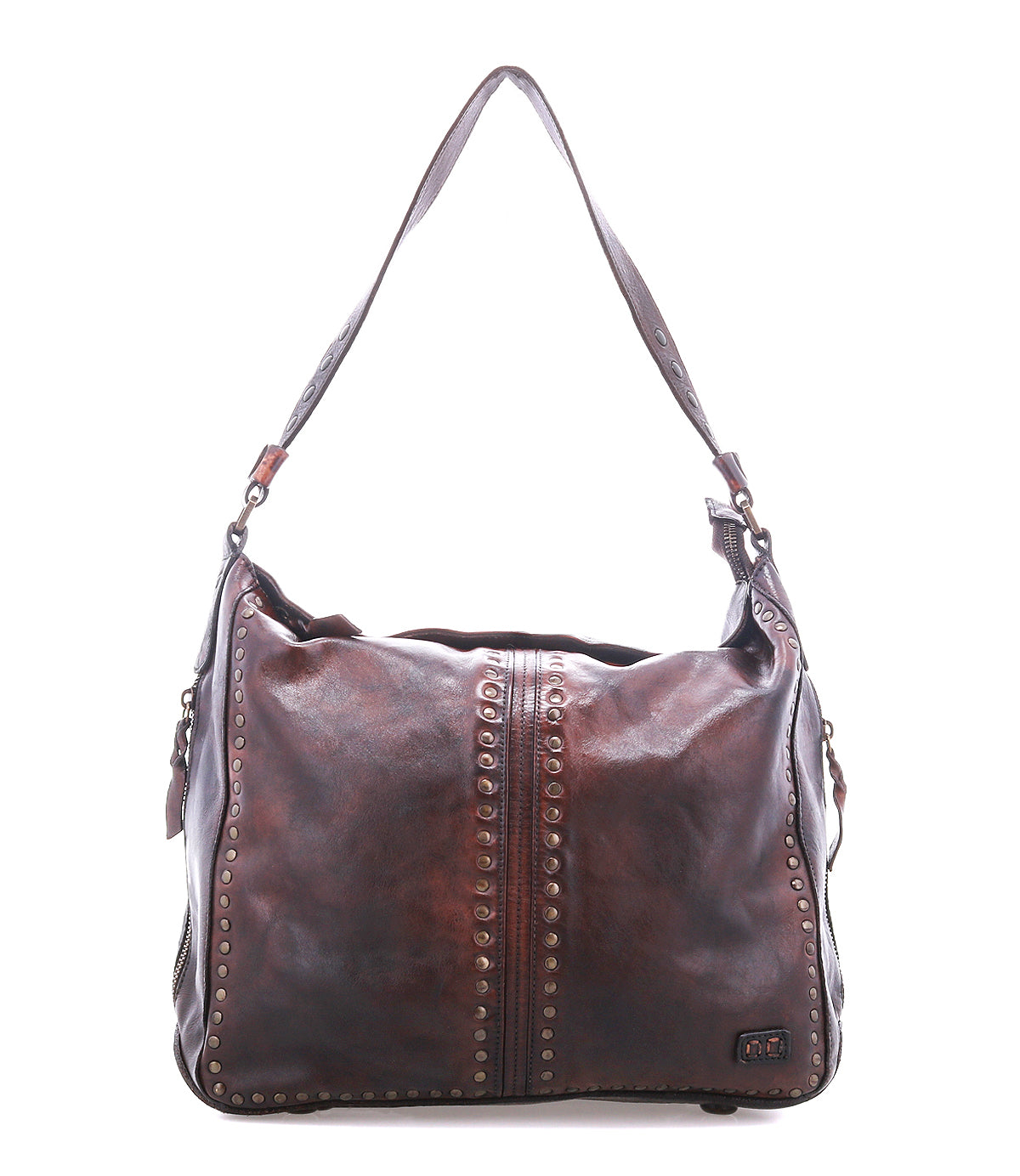 The Packet LTC by Bed|Stü is a large brown leather shoulder tote featuring metal stud detailing, a wide strap, and a slightly worn finish, shown against a white background.