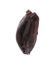 Bed|Stü’s Packet LTC brown leather travel tote is shown from above with the main zipper open to reveal multiple inner compartments and pockets; the shoulder tote bag appears empty.