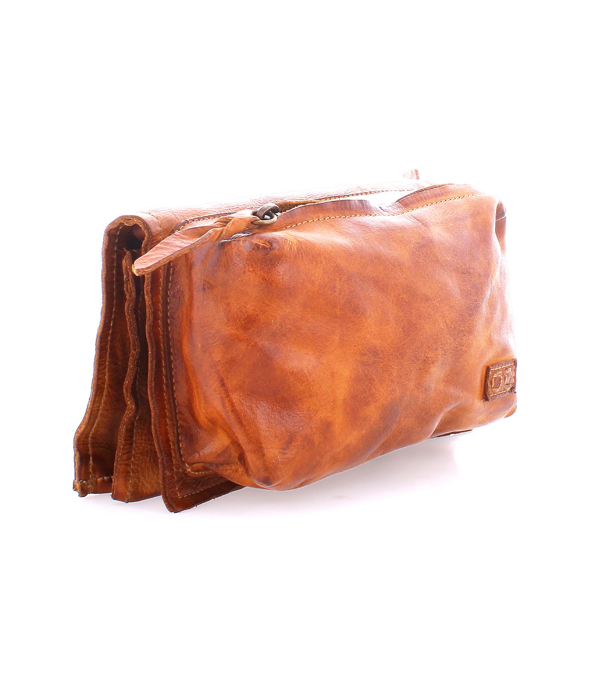 The Parle toiletry bag by Bed|Stü features soft brown leather, zippered compartments, and a durable top zipper, displayed against a white background.