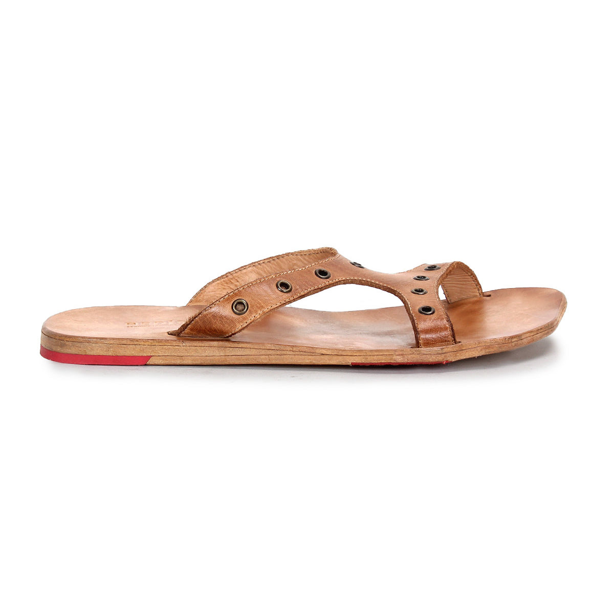 Introducing Path by Bed|Stü: a brown leather slip-on sandal featuring an open toe, metal eyelet accents, and a flat wooden sole with a slim red highlight at the heel. Crafted for effortless everyday wear, this leather sandal is pictured in a side profile view against a white background.