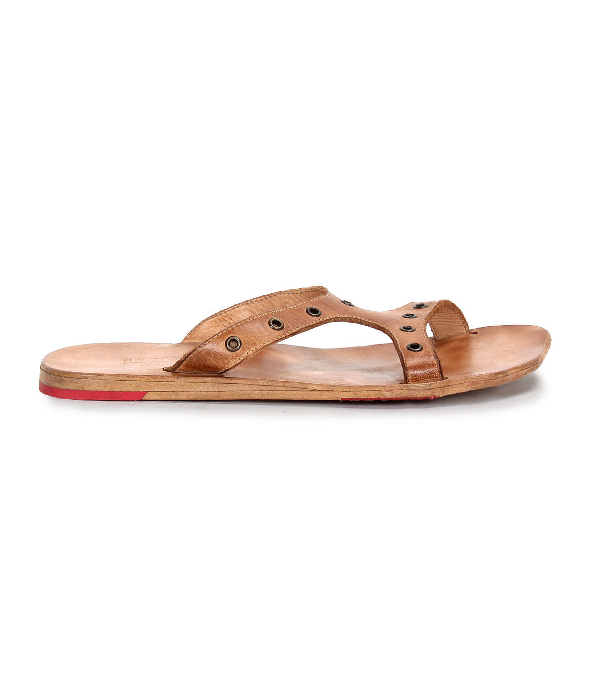 Introducing Path by Bed|Stü: a brown leather slip-on sandal featuring an open toe, metal eyelet accents, and a flat wooden sole with a slim red highlight at the heel. Crafted for effortless everyday wear, this leather sandal is pictured in a side profile view against a white background.