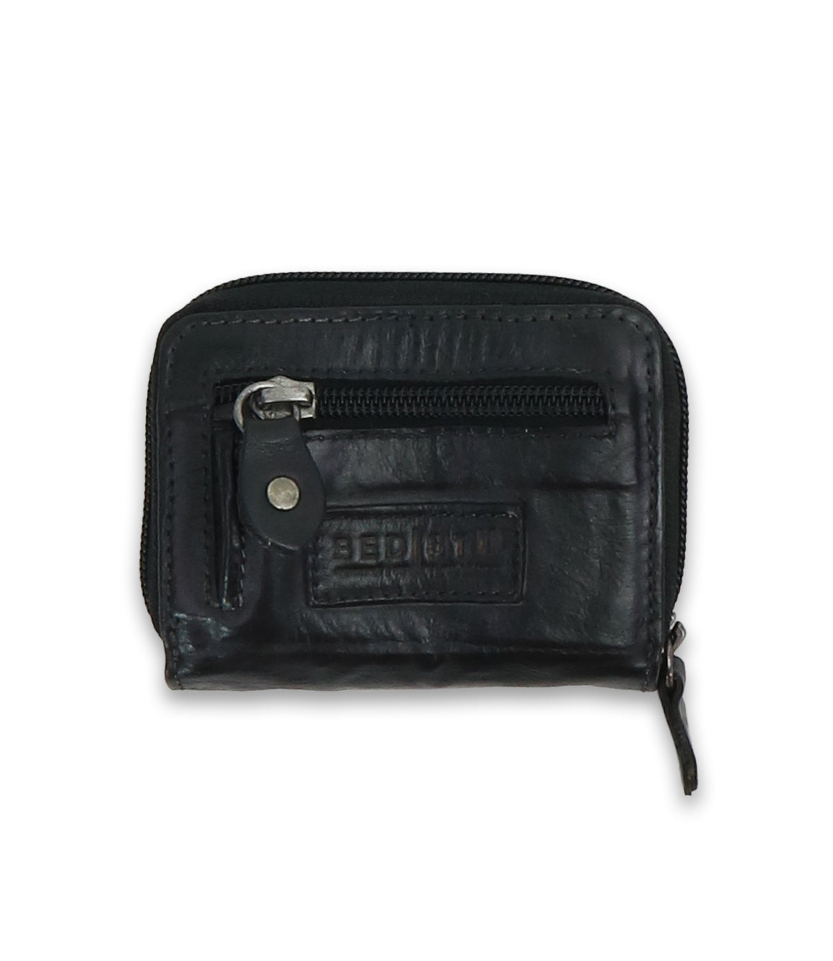 The Peek by Bed|Stü is a small black premium leather coin pouch featuring two zippered compartments, accordion card slots, and a snap button detail, displayed on a plain white background.
