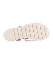 The image displays the bottom view of a white, ridged rubber sole with horizontal grooves—characteristic of platform sandals—from the Bed|Stü Perfect shoe, photographed against a white background.