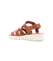 Bed|Stü "Perfect" brown leather fisherman sandals, shown from the side and slightly behind on a white background, featuring multiple leather straps and a thick, white ridged sole.