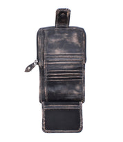 A worn, open bifold wallet called "Plus" by Bed|Stü, crafted from leather with multiple card slots, a zippered coin pocket compartment, and a snap-button flap, displayed on a white background.