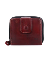 Introducing the Bed|Stü Plus—a dark red compact leather wallet, accented with white stitching. It features a right-side zipper closure, a front snap button tab, and a handy zippered coin pocket inside for added convenience.