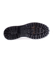Portare boot sole by Bed|Stü shown from the bottom, featuring deep, rugged treads and Bed|Stü branding visible in the center—highlighting the durability and craftsmanship that define these Italian handmade Portare boots.