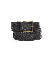 The Proem belt by Bed|Stü is a handwoven dark brown leather accessory featuring a vintage metal buckle, shown coiled against a plain white background.