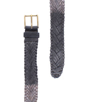 Two views of the Bed|Stü Proem, a dark brown handwoven leather belt showcasing artisan craftsmanship and a vintage metal buckle, displayed on a white background.