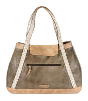 The Proper by Bed|Stü is a taupe leather handbag featuring handwoven cream straps, an organic cotton-lined interior, a front zip pocket, and a small metal Bed|Stü brand plate at the bottom center.