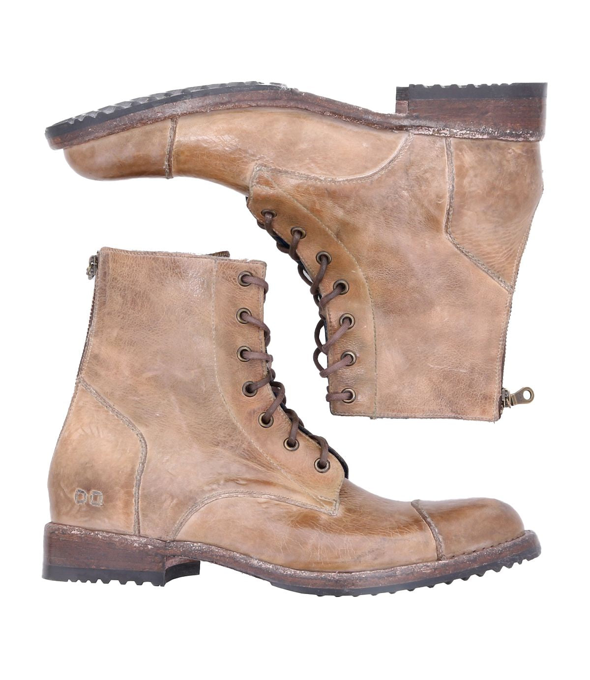 The Protege by Bed|Stü is a pair of tan leather lace-up combat boots featuring side zippers, low stacked heels, and a lightly worn texture. Displayed side by side against a white background, these durable boots offer classic styling and rugged details for everyday wear.
