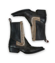 A pair of Bed|Stü Raise black and brown leather Western short boots with decorative stitching, studded accents, a snip toe, and a short heel, displayed side by side on a white background.