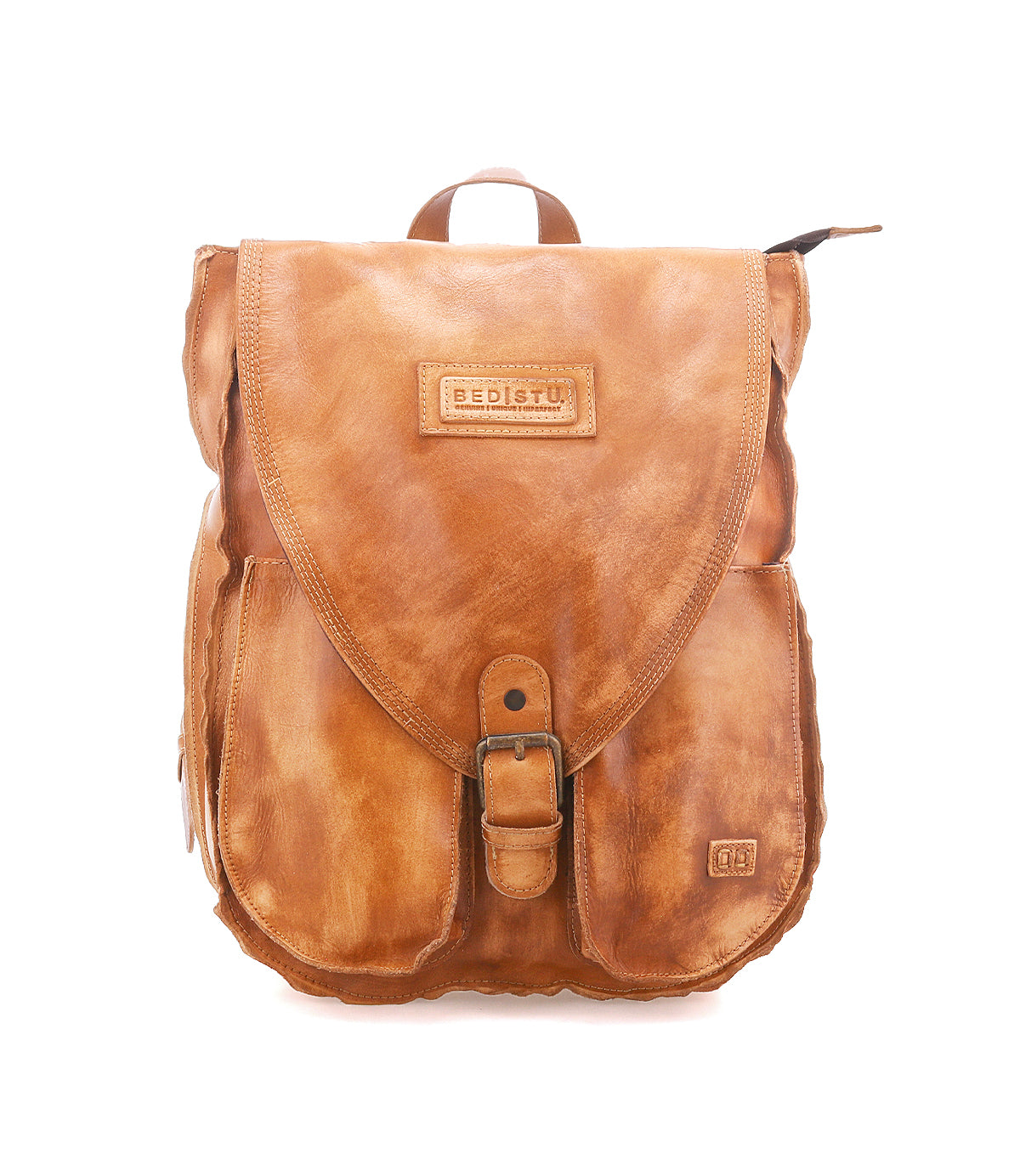 The Bed|Stü Ranger is a brown leather backpack featuring a front buckle, flap closure, and convenient side pockets. With the "Bed|Stü" label on the front, this structured bag boasts a sturdy build and a vintage, worn-in finish—perfect for everyday use.