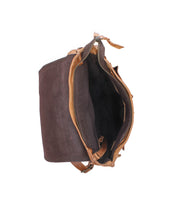 The Bed|Stü Ranger is a brown leather and suede shoulder bag shown from above with its zipper open, revealing a spacious, unlined main compartment—perfectly designed for everyday wear with sturdy construction that ensures lasting style and function.