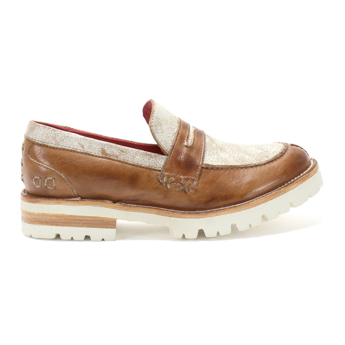 The Bed|Stü Reina III is a brown and gold, hand-finished leather penny loafer featuring a thick white treaded sole, visible stitching, and a contrasting red interior lining, shown here in profile.