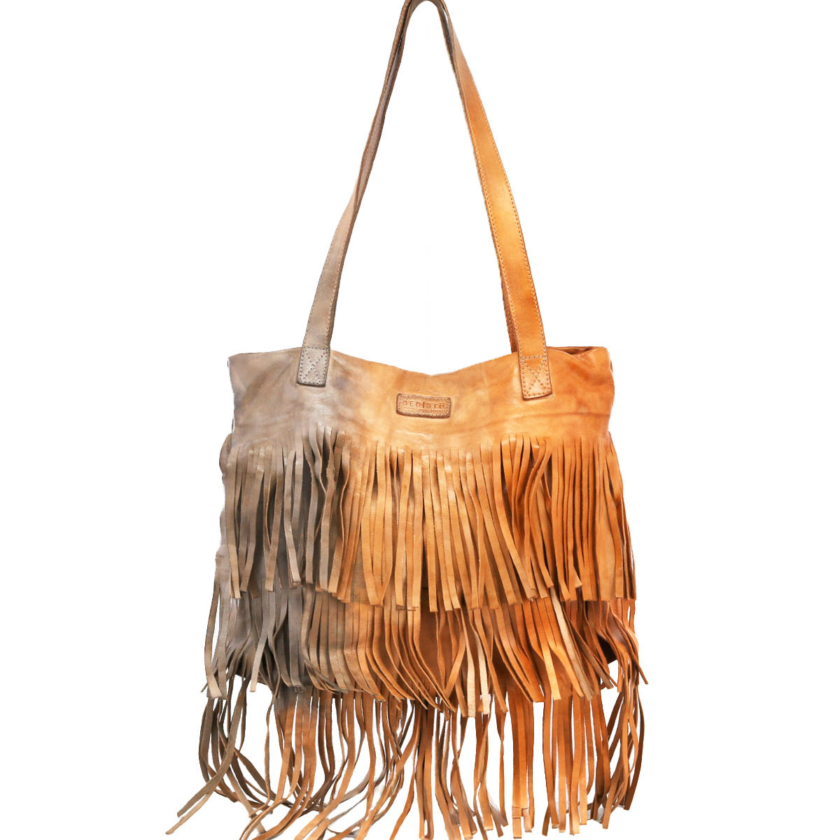Introducing the Rimes by Bed|Stü—a handcrafted tan leather tote bag featuring dual handles and distinctive layered fringe detailing along the bottom and front. Its spacious interior provides ample room for all your daily essentials, combining practical functionality with eye-catching style.