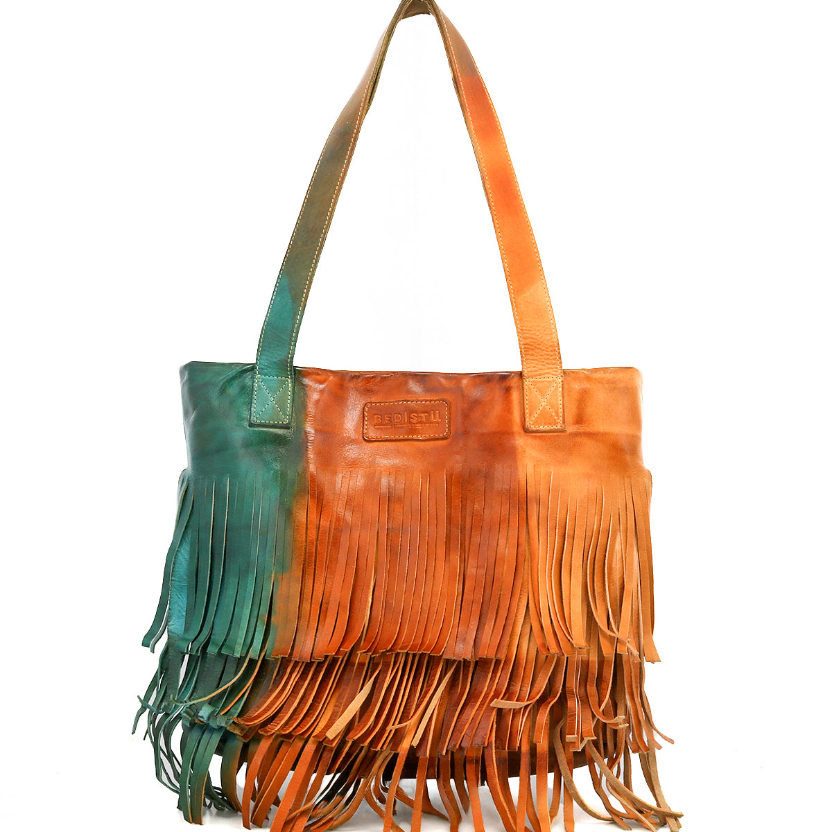 The Rimes tote bag by Bed|Stü is a handcrafted leather accessory, showcasing a vibrant green-to-orange gradient, striking fringe accents, and a spacious interior.