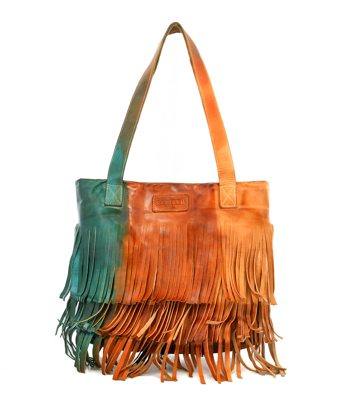 The Rimes tote bag by Bed|Stü is a handcrafted leather accessory, showcasing a vibrant green-to-orange gradient, striking fringe accents, and a spacious interior.