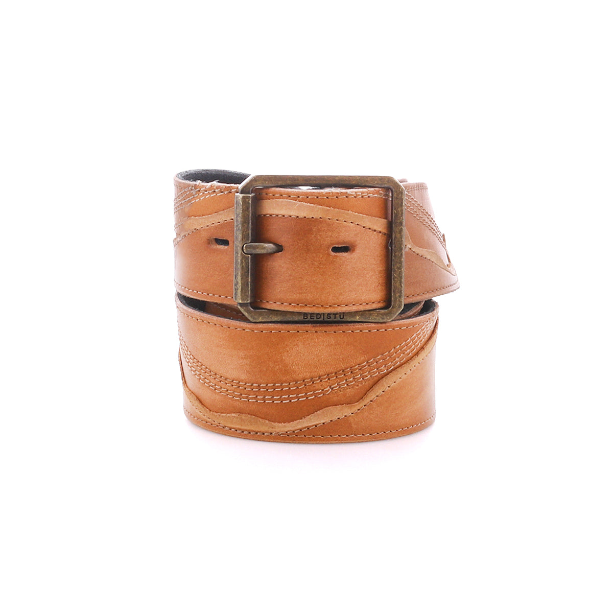 Introducing the Riven by Bed|Stü: a sturdy tan leather belt featuring a brass buckle, artfully rolled and photographed on a white background—ideal for everyday wear.