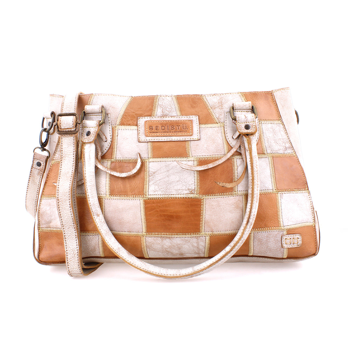 Tan and white patchwork upcycled leather Rockababy SL bag by Bed|Stü, featuring double handles, a detachable shoulder strap, and a visible brand label on the front.