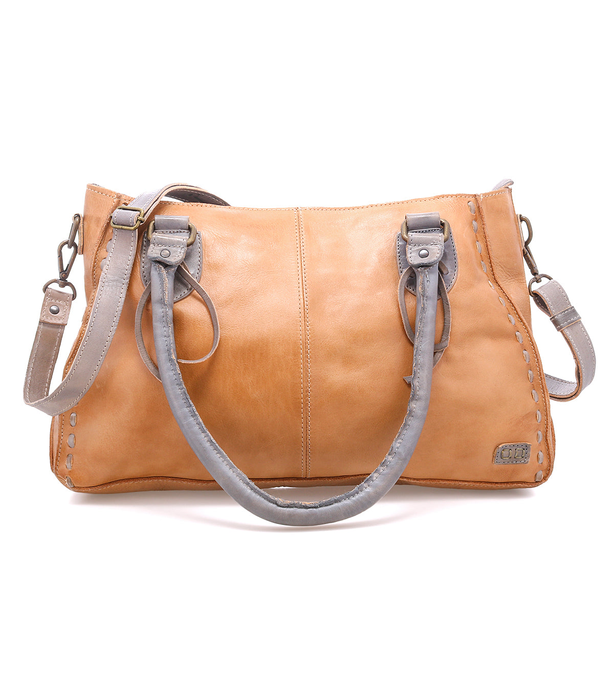 Introducing the Rockababy by Bed|Stü: a compact tan leather bag with gray handles and an adjustable crossbody strap, expertly crafted from vegetable-tanned leather. It features stitched detailing and a small metal Bed|Stü tag on the front.