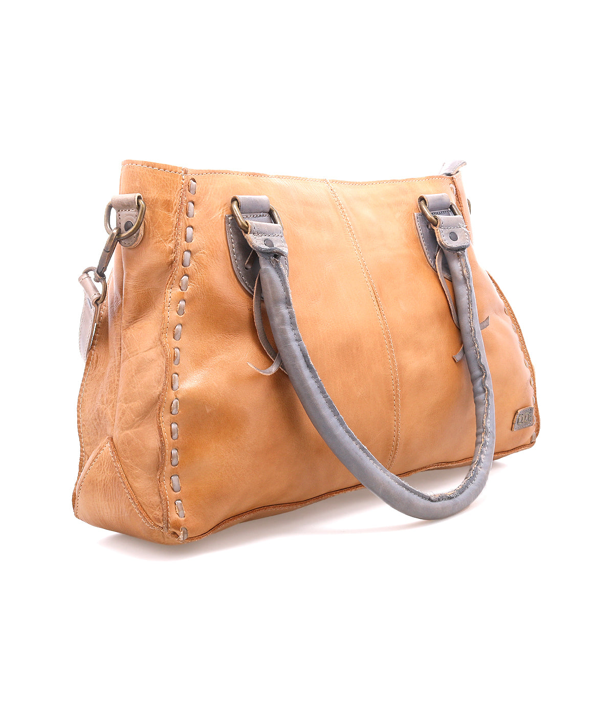 Rockababy by Bed|Stü is a compact, light brown vegetable-tanned leather handbag featuring gray handles and detailed stitching, shown against a white background. This stylish leather bag offers timeless appeal and functional elegance.