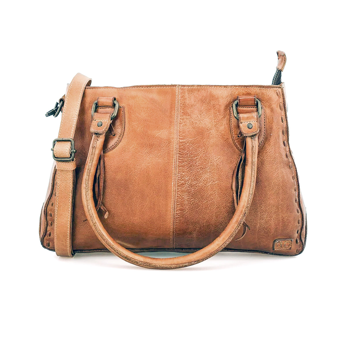 Introducing the Rockababy by Bed|Stü—a compact handbag crafted from rich brown vegetable-tanned leather, featuring two sturdy handles, an adjustable crossbody strap, visible stitching details, and a secure zippered top closure.