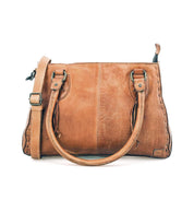 Introducing the Rockababy by Bed|Stü—a compact handbag crafted from rich brown vegetable-tanned leather, featuring two sturdy handles, an adjustable crossbody strap, visible stitching details, and a secure zippered top closure.