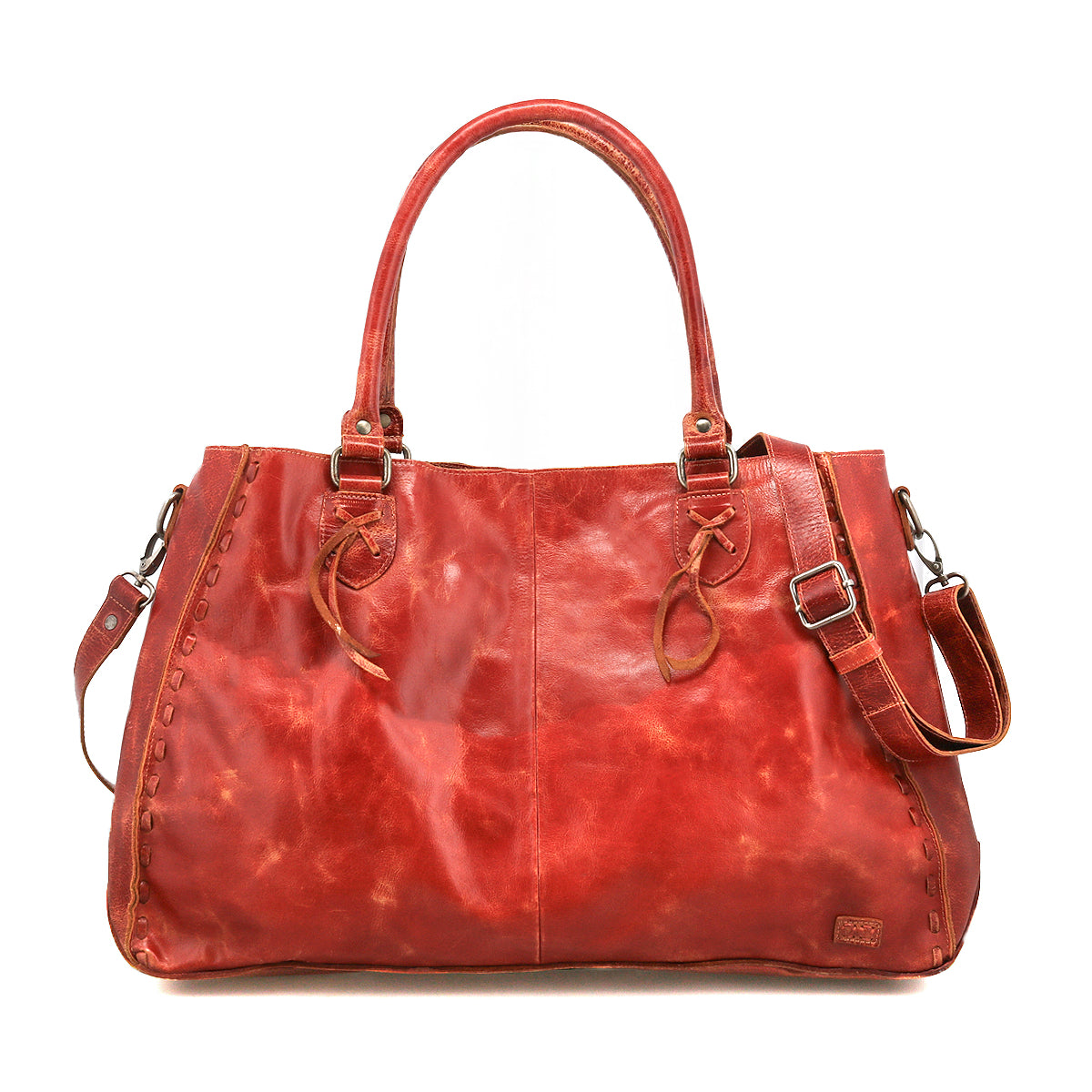 The Rockaway by Bed|Stü is a large red full-grain leather handbag featuring two handles, an adjustable shoulder strap, and decorative side stitching, designed for everyday use and showcased against a plain white background.